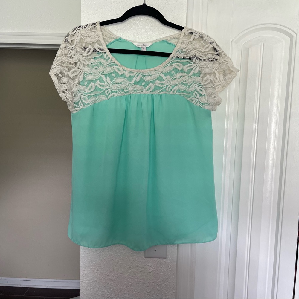 Charming Charlie size Large Teal and white blouse